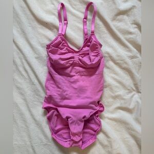 SKIMSseamless sculpt brief body suit in hot pink